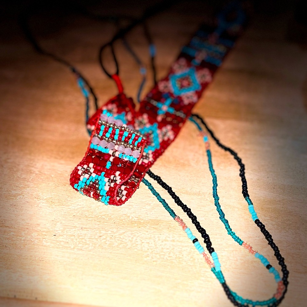Native American beaded headband, and with the necklaces included.